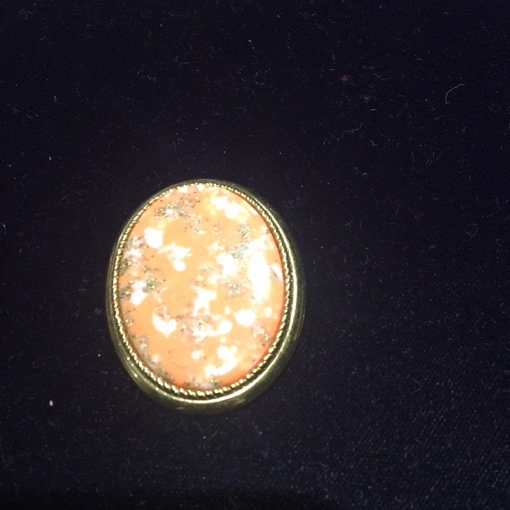 Coral and gold pin